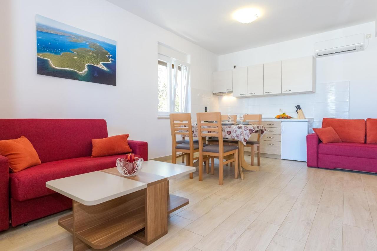 Apartments By The Sea Veli Rat, Dugi Otok - 11525 Esterno foto